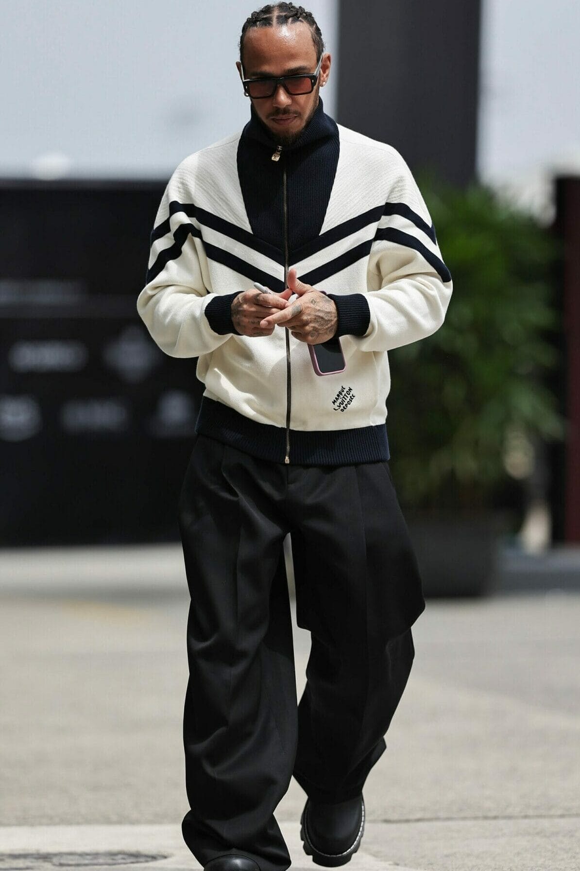 Lewis Hamilton wears Louis Vuitton to arrive at the Shanghai F1 Grand Prix